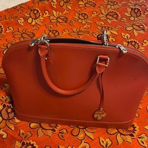 Orange handbag with over the shoulder strap
